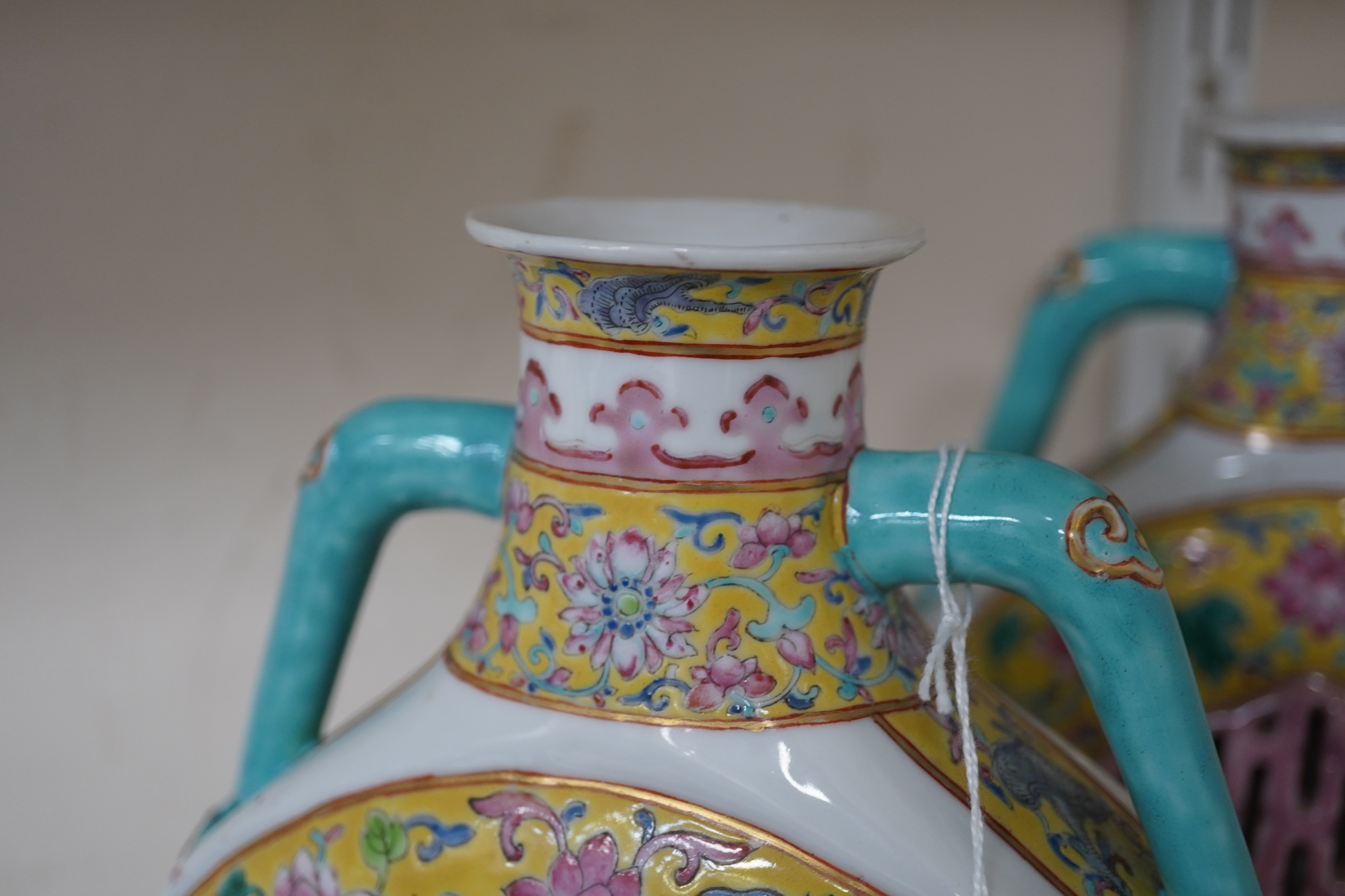A pair of Chinese yellow ground double-walled moonflasks, bianhu, Daoguang marks, 19th century